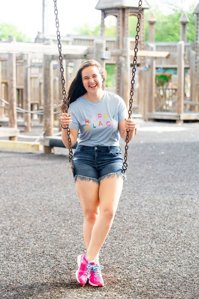 Playing-At-The-Playground-Happy-Place-Tee-Red-Dress-Boutique-Frayed-Denim-Shorts-Pink-Nike-Sneakers