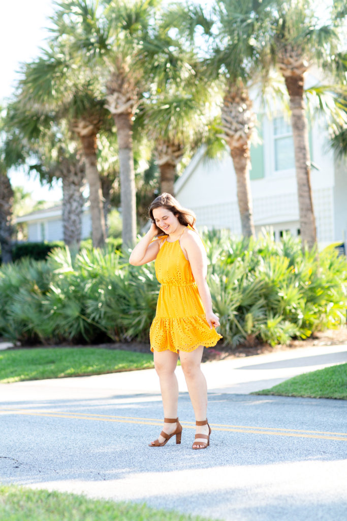 Brunette-Girl-Wearing-Revolve-Lovers-Friends-Yellow-Evie-Mini-Sundress-With-Brown-DSW-Sandals