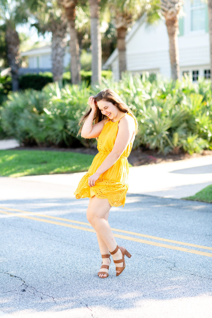Brunette-Girl-Wearing-Revolve-Lovers-Friends-Yellow-Evie-Mini-Sundress-With-Brown-DSW-Sandals
