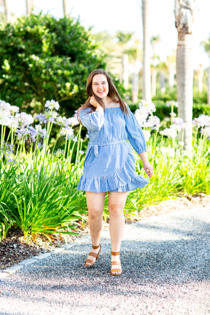 Brunette-Girl-Wearing-Tularosa-Maida-Ruffle-Mini-Wrap-Dress-With-Kelly-And-Katie-Brown-Block-Heel-Sandals