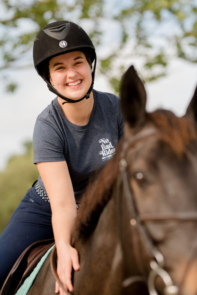 Horseback-Rider-Wearing-Affordable-Riding-Outfit-From-Smartpak-Hunt-Club-Equestrian-And-One-K-HJelmets