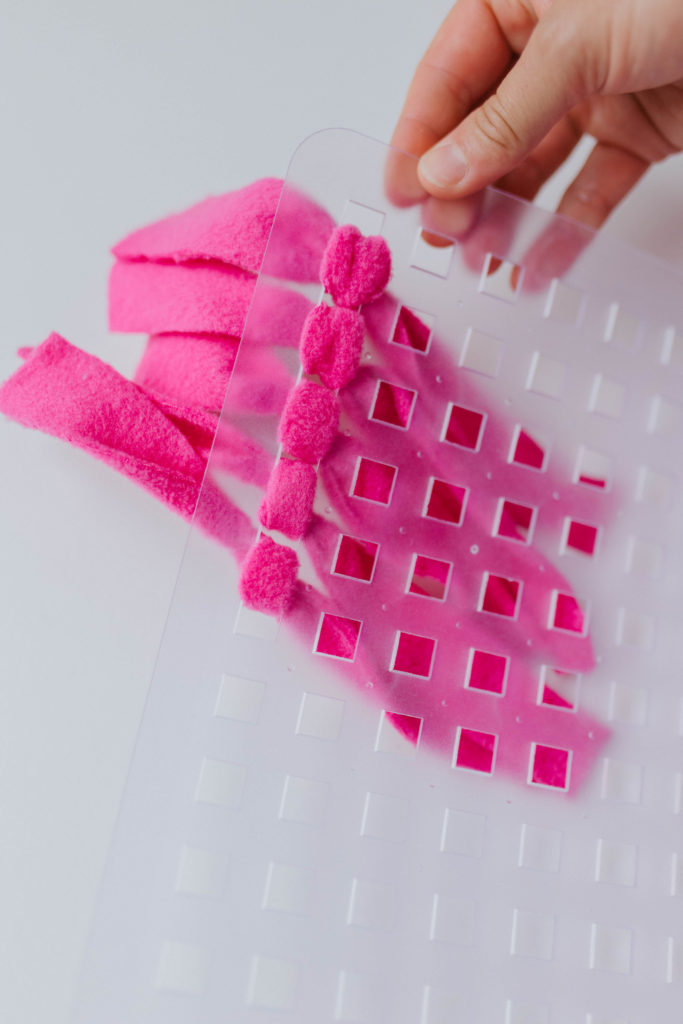 DIY snuffle mat for dogs using sink mat and fabric sparkles and sunshine blog