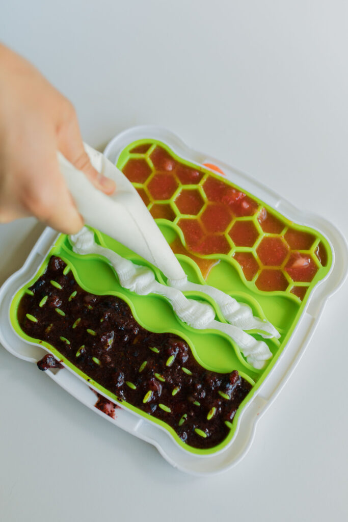 Frozen yogurt blueberry strawberry dog treat recipe on Trixie lick n’ snack licking plate dog lick mat Sparkles and Sunshine blog